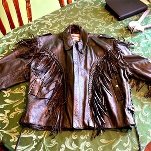Route 66 vintage leather biker jacket w fringe and laced sides well made heavy